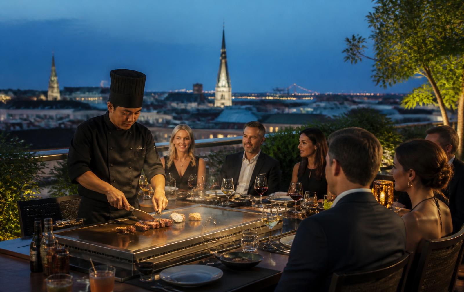 Chef slicing seared steak at a rooftop corporate dinner in Savannah at blue hour.